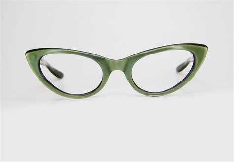 green cat eye glasses